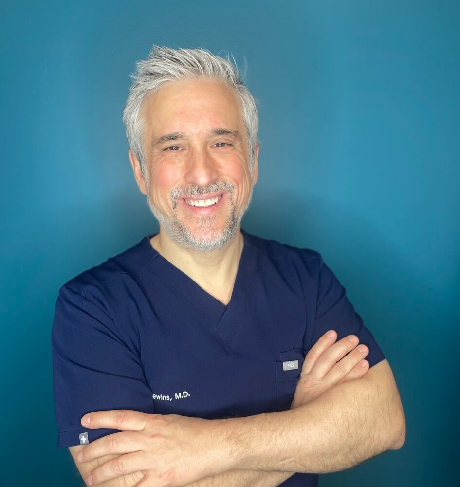 John L. Fewins, MD, FACS
